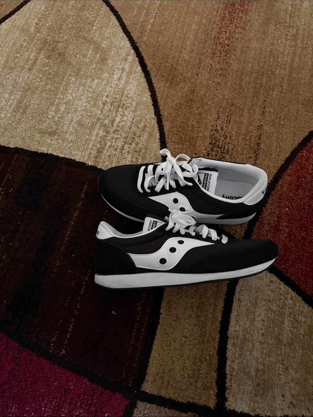 Black and White Woman’s Saucony Hornet Athletic Sneakers